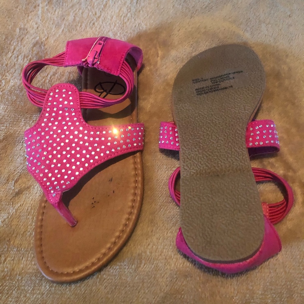 Pink sandales with rhinestones on top zip up the back size 2
